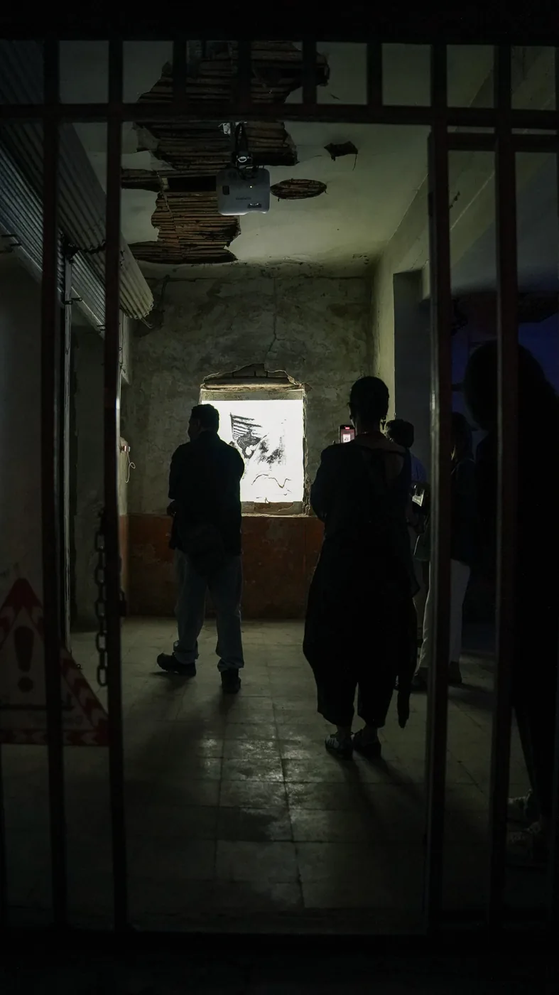 A succession of doorways connects visitors and projected images.